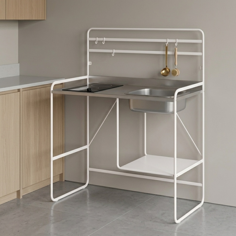 IKEA SUNNERSTA compact mini-kitchen with stainless steel sink, worktop, storage shelf and white steel frame for small studio apartments.