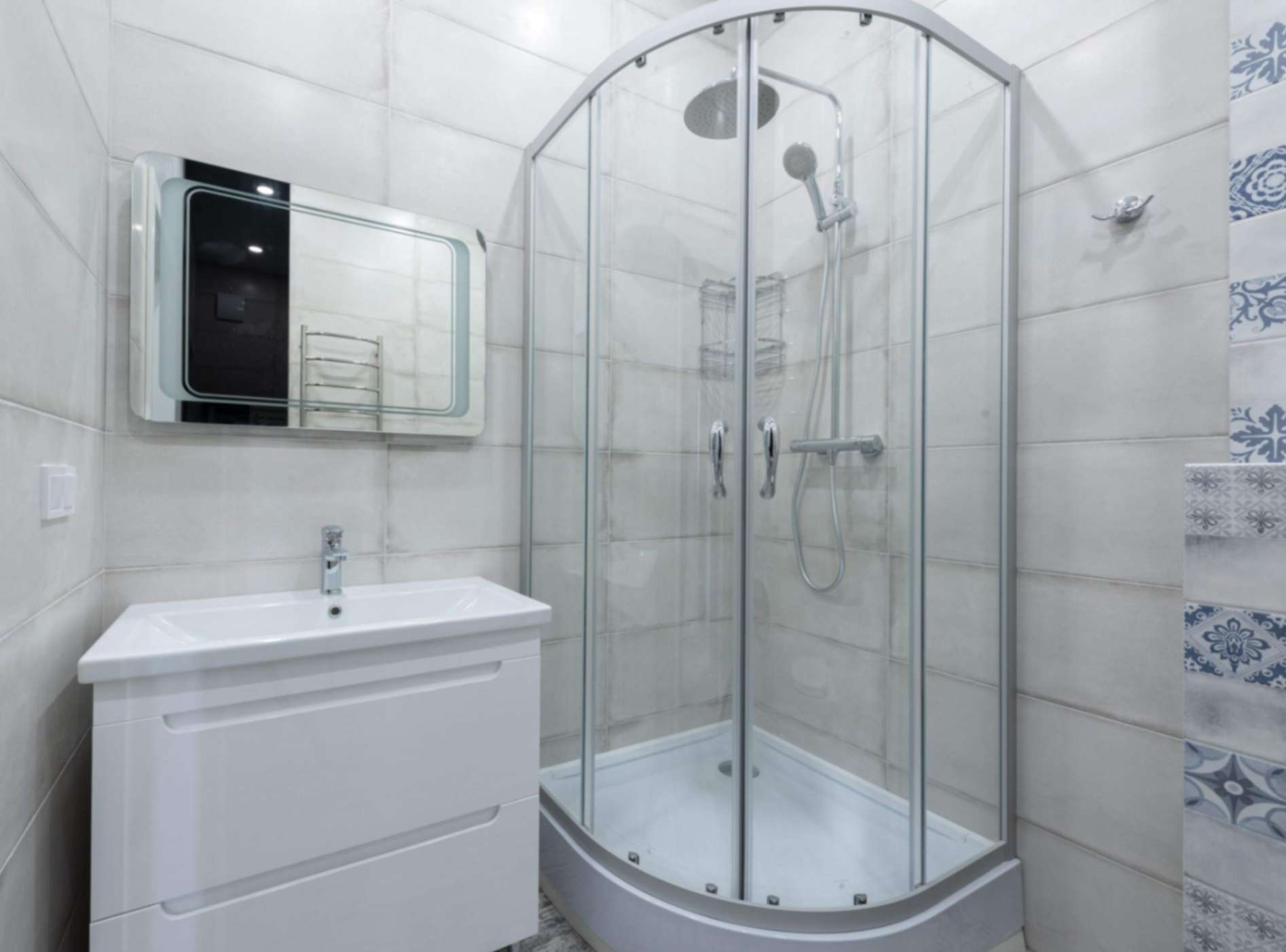 : Clear glass shower creating an open bathroom view