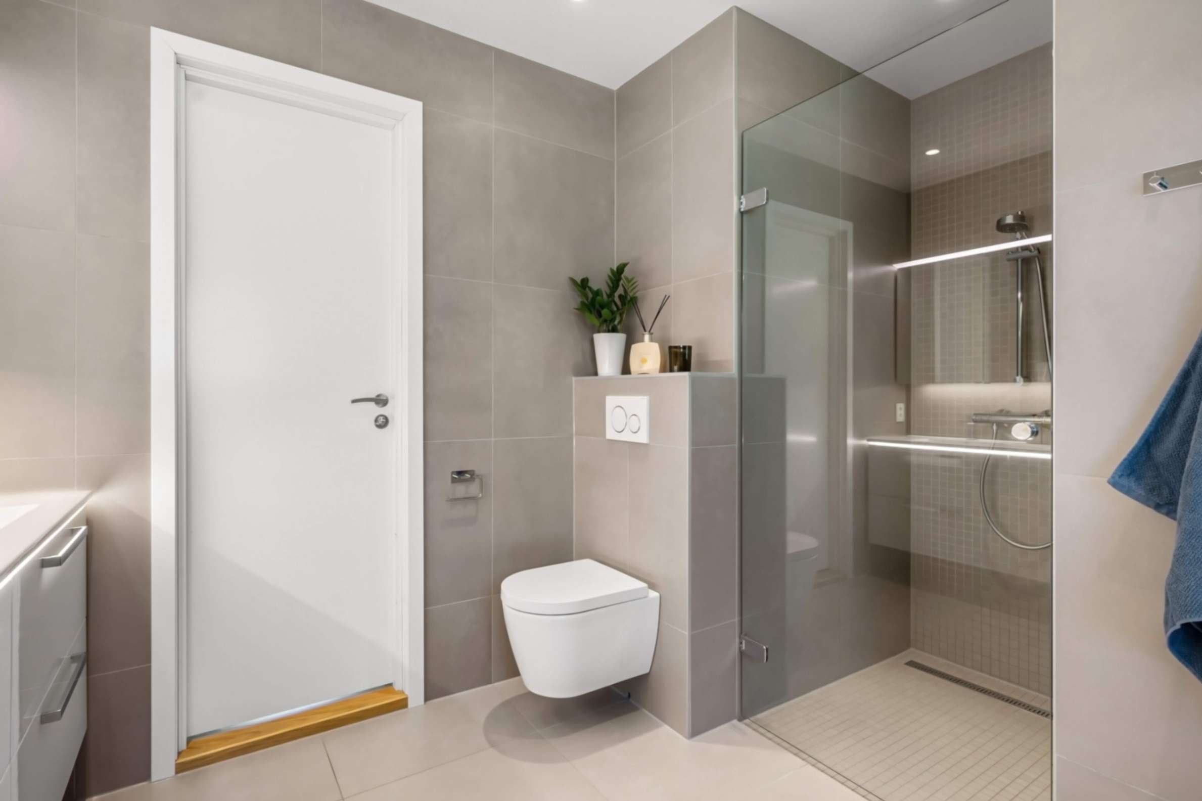 Wall-hung toilet creating visible floor space